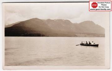 5_people_in_a_row_boat_on_unknown_lake_either_kalum_lake_or_lakelse_lake_marked.jpg