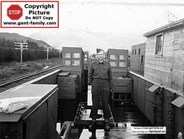 railway_cars_on_which_anti-aircraft_guns_could_be_mounted_in_case_of_attacks._terrace_b.c._summer_1944.jpg