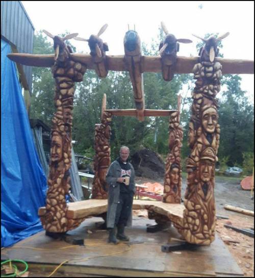 The artist Darren Jones, stands justly proud of his work