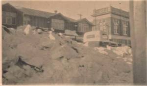 Taken from NE corner of 12th Ave and 4th St. Campbell block, and Harold J. Clasky's store, on left, Smith Block on right, all on West side of 12th Ave.  Campbell Block, and Clasky Store building would be on corner, where B of M is today.  History books say this was an empty lot.  Not true obviously. 