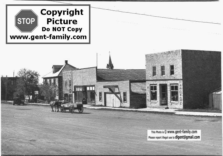 Main Street, portion of Business Section, Milts Hardware on right, Milt Ulmer operated this store